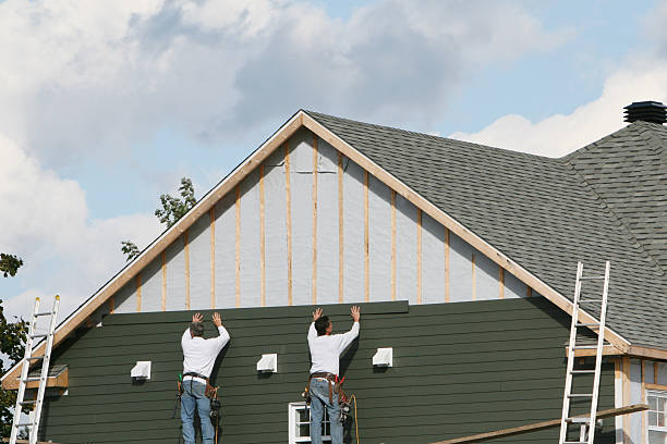 Professional Siding technician working in North Springfield, PA